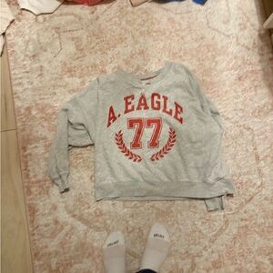 A. Eagle Gray and Red Sweatshirt